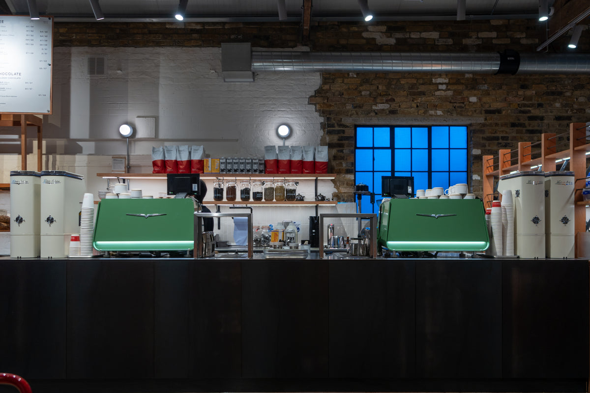 Two espresso machines on a café counter, installed by Modern Standard Service